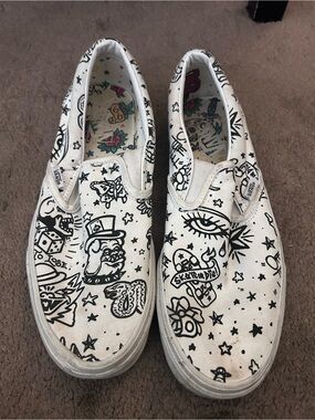 Vans White Slip-On Sneakers with Black Doodle Print